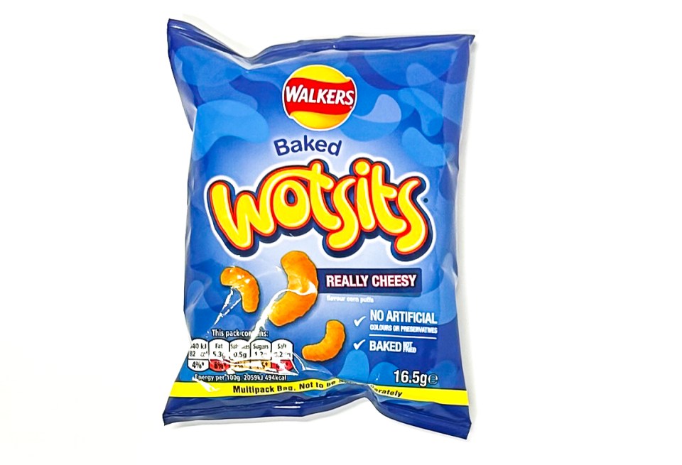 a blue bag of walkers baked wotsits on a white background