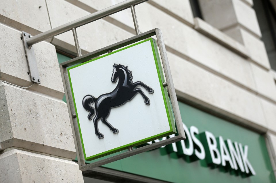 a sign for a bank with a horse on it