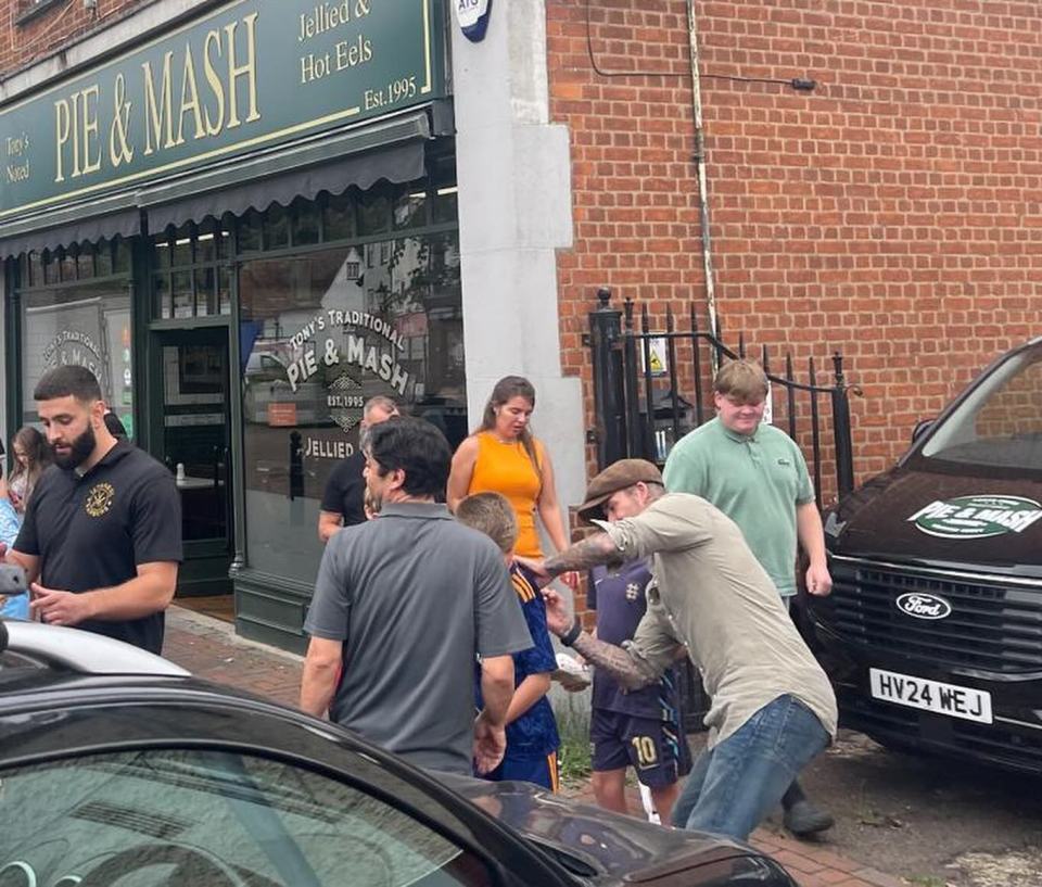 David was seen signing autographs and football shirts