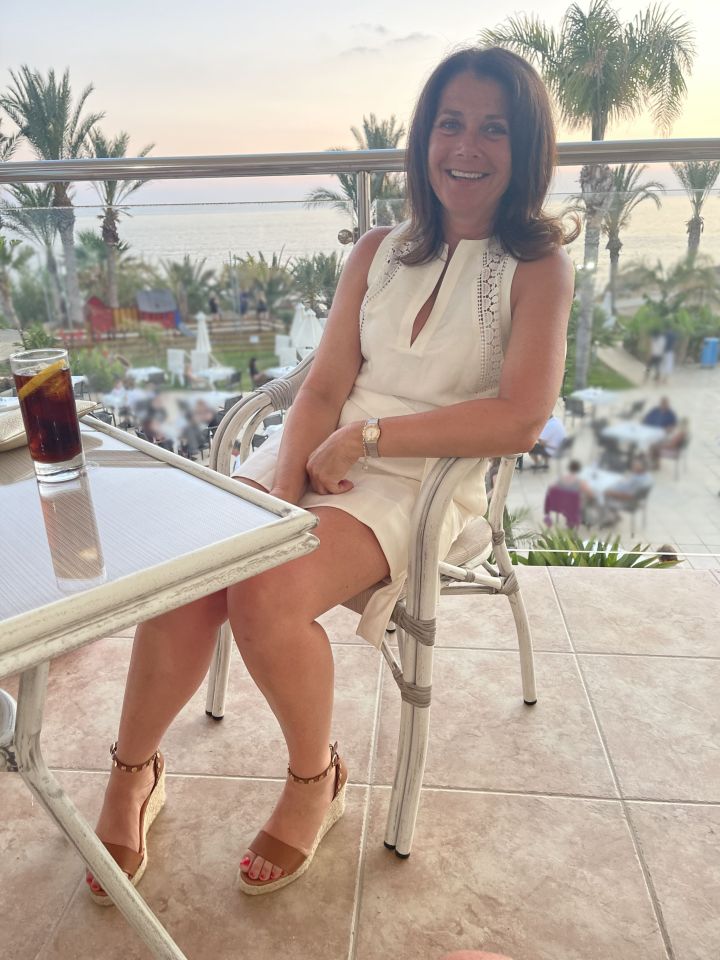 Caroline Burson, 53, was washing her hair while on holiday in Paphos when her left arm went dead