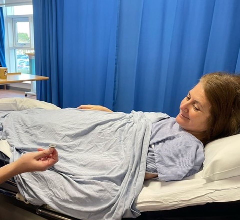 Caroline being prepped for an operation to close a hole in her heart that caused a spinal cord stroke