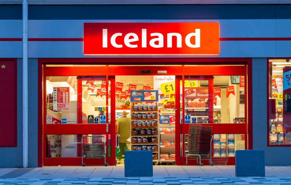 a store front with a red sign that says iceland