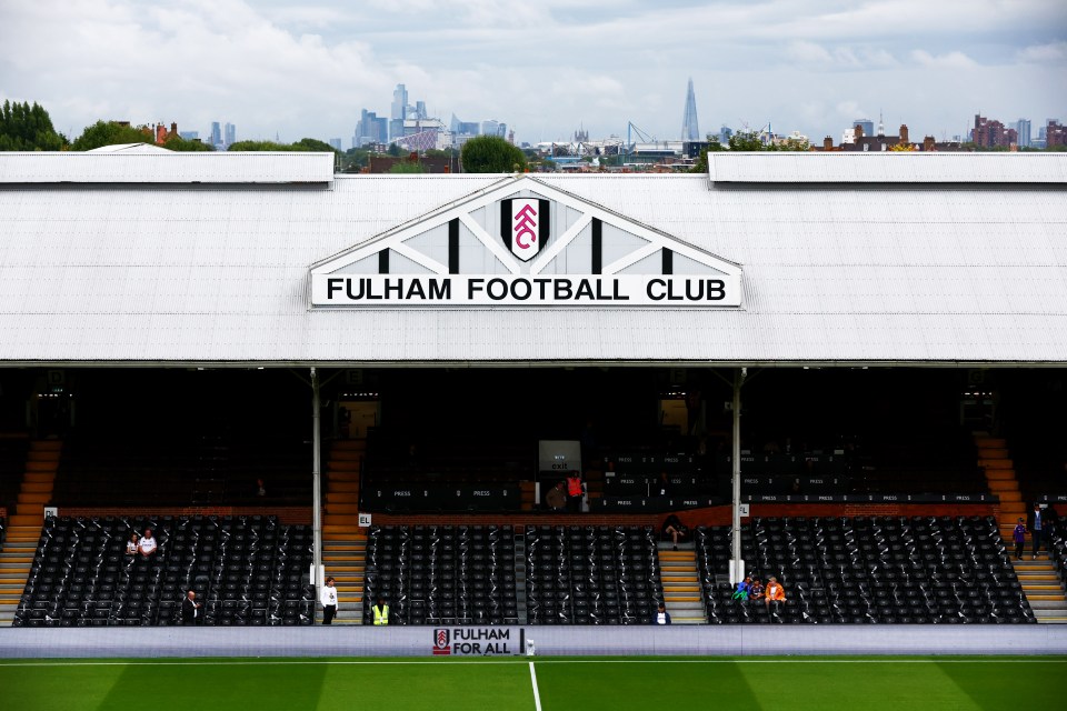 an empty stadium with a sign that says fulham football club