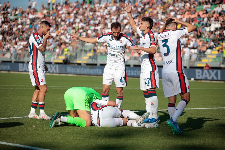 a group of soccer players with one wearing the number 3