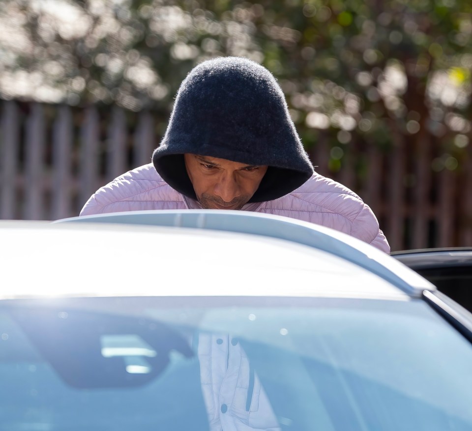 Blades wore a black hoodie and pink coat as he left after being charged