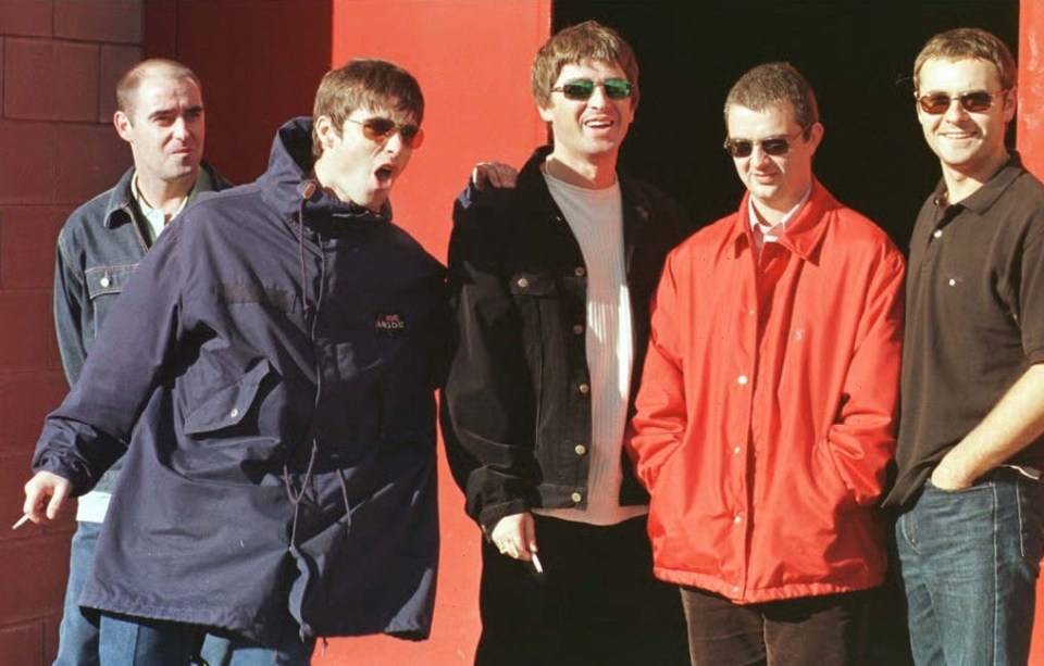 a group of men standing next to each other in front of a sign that says mc y pa news