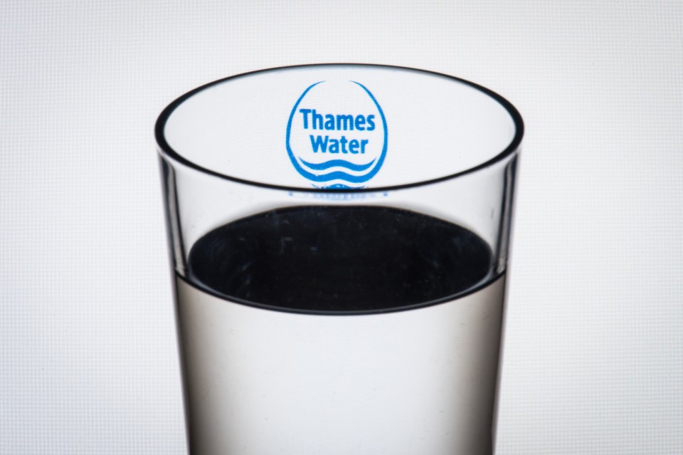 a glass that says thames water on it