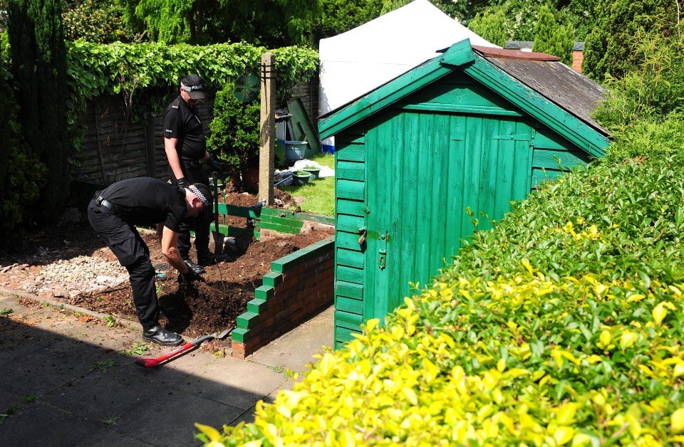 Police searching the garden of an address in Coventry