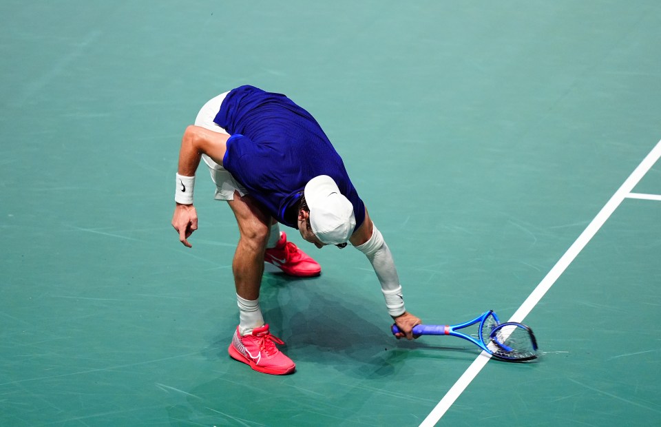 The mangled racquet was crunched into the court five times