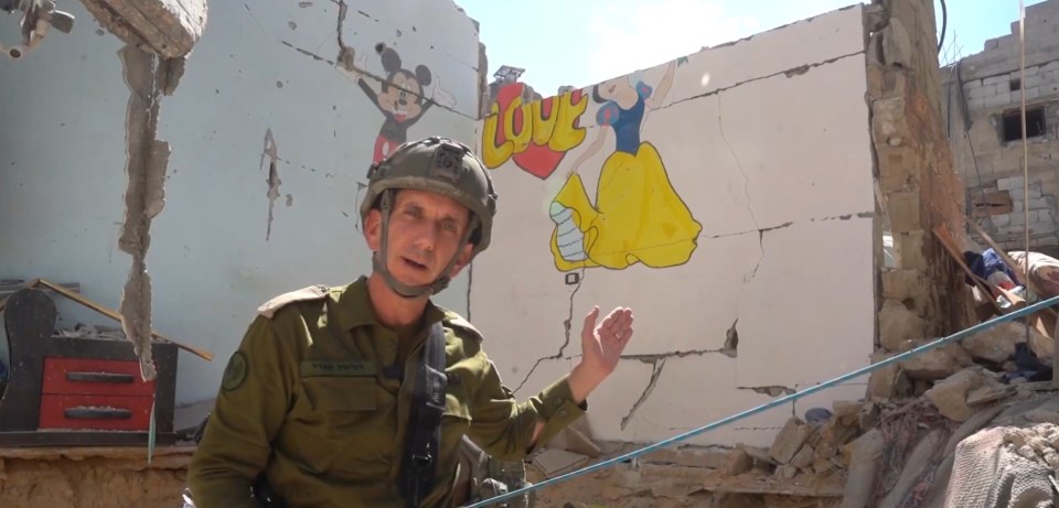 IDF spokesperson Daniel Hagari shows the Gaza tunnel where the hostages were kept