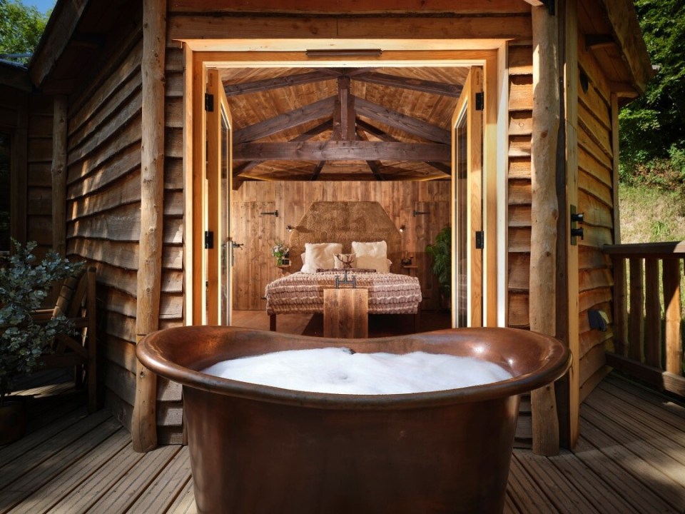 The Hideout at Sleep Owl has a hot tub