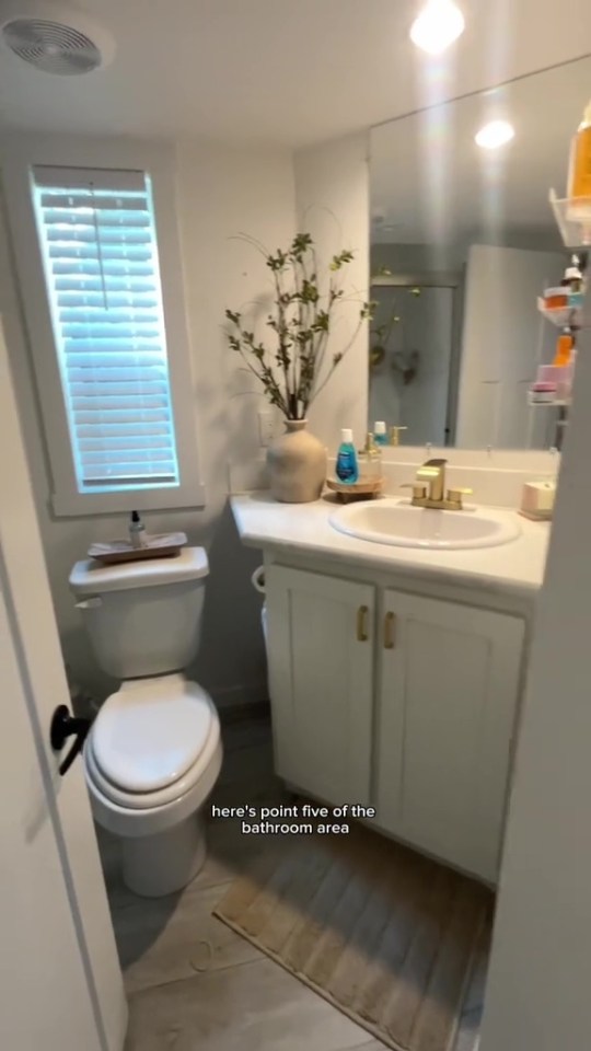 Her tiny home includes a bathroom area and changing room