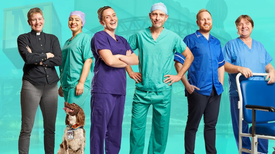 a group of doctors and nurses standing next to each other