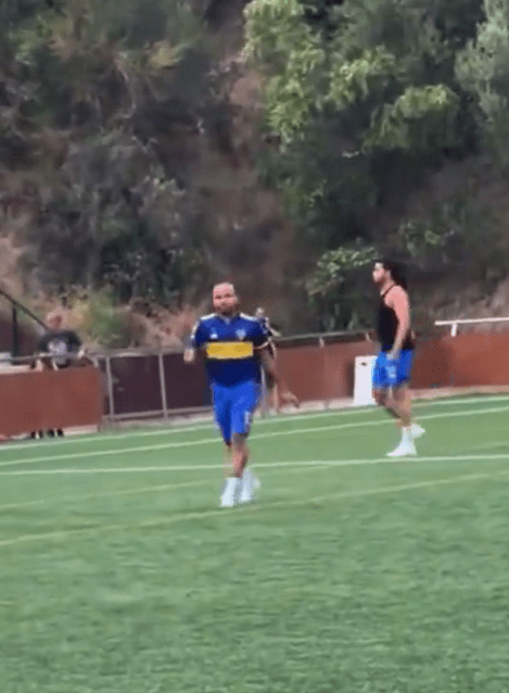 The disgraced footballer donned a Boca Juniors shirt