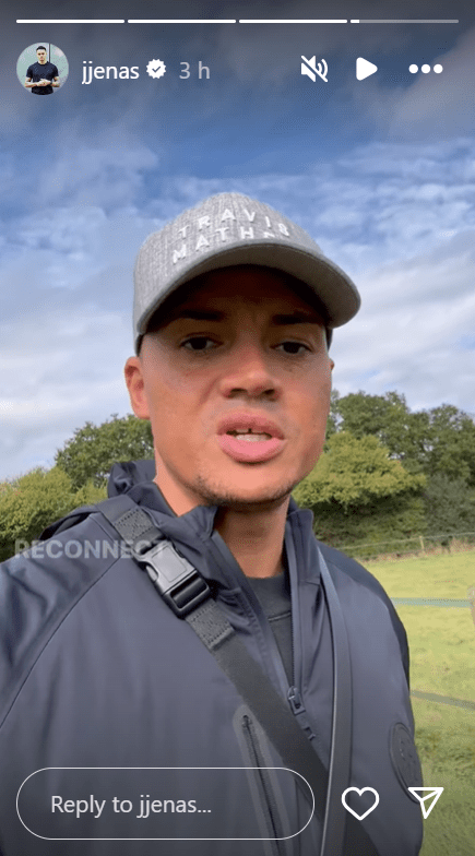 a man wearing a hat with the word heavy on it