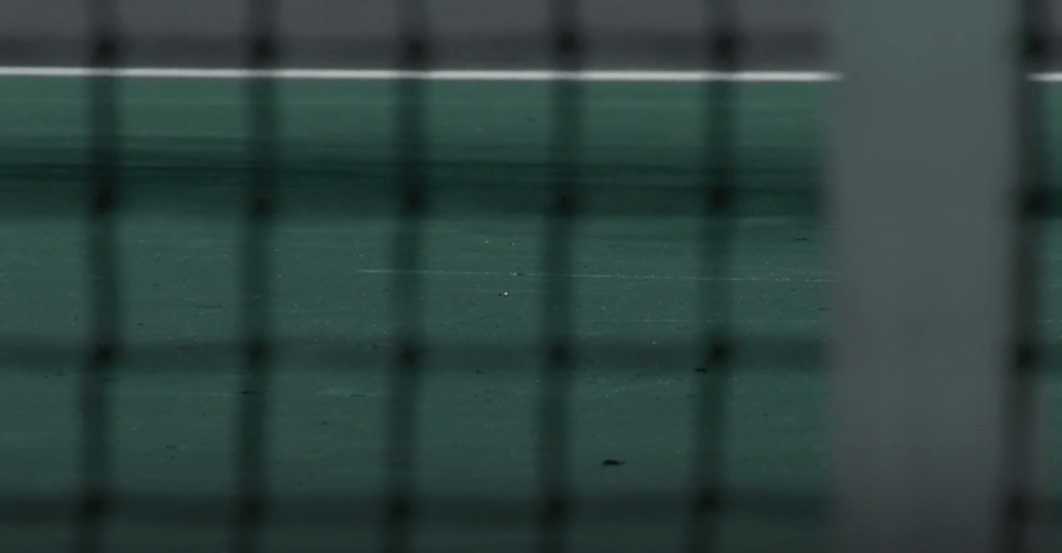 Fragments of the racquet were left across the court