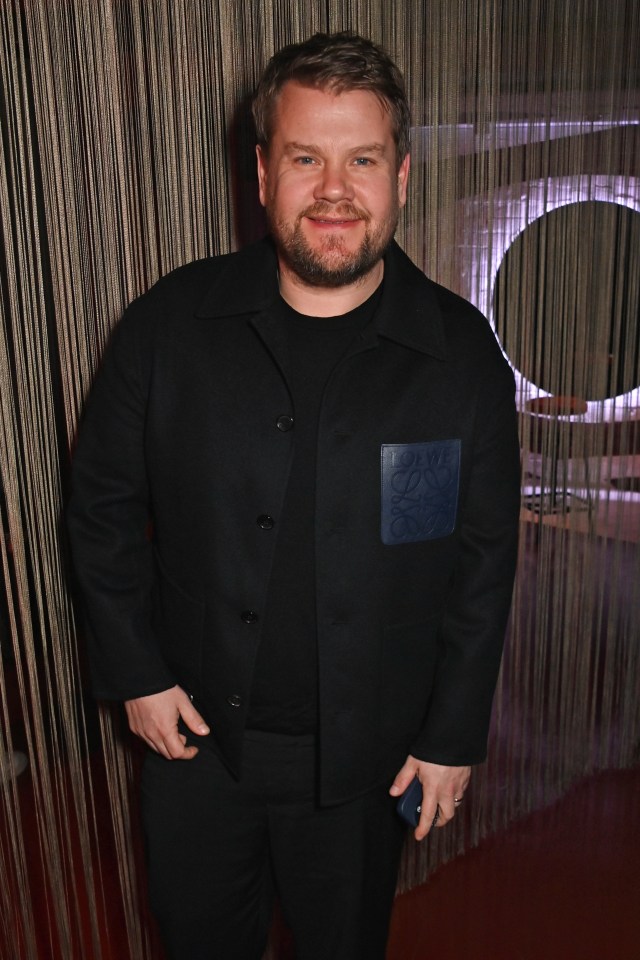 a man in a black jacket with a loewe pocket