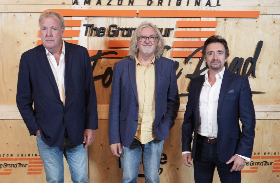 three men stand in front of a sign that says amazon original