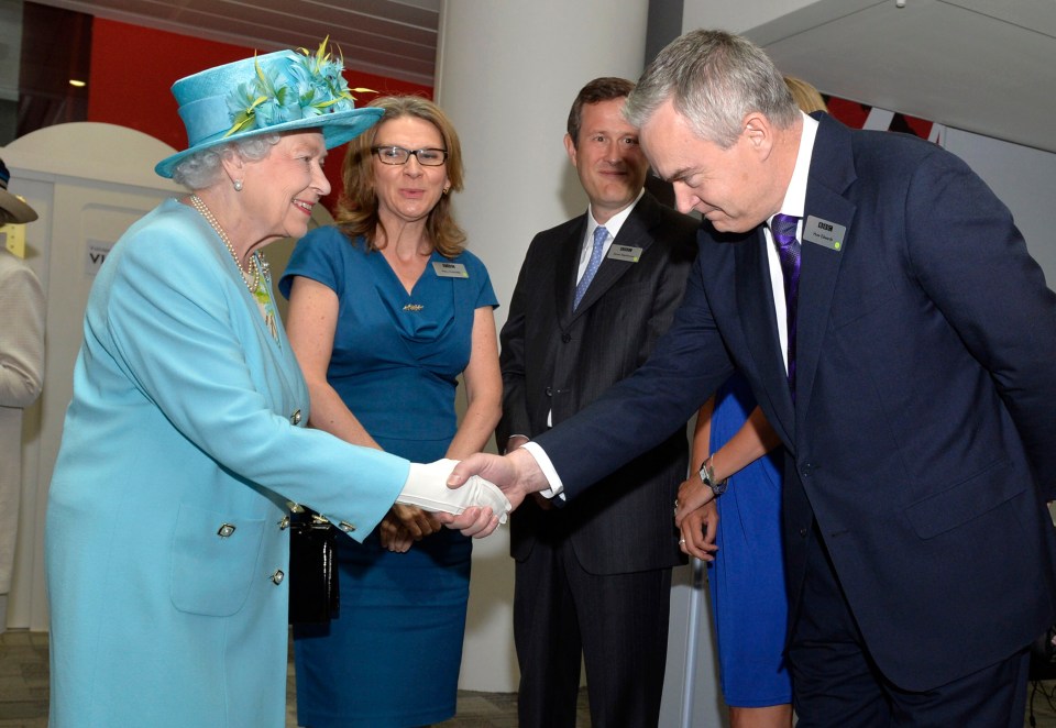 Queen Elizabeth ll meeting the now disgraced newsreader at Broadcasting House in 2013