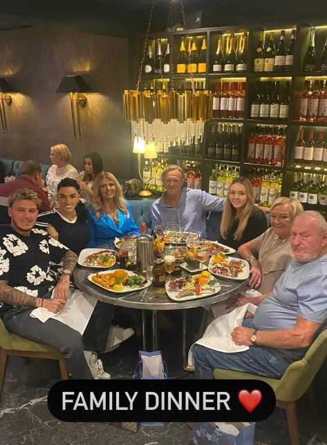 Katie Price beamed as she enjoyed a 'family dinner' with JJ Slater and his relatives