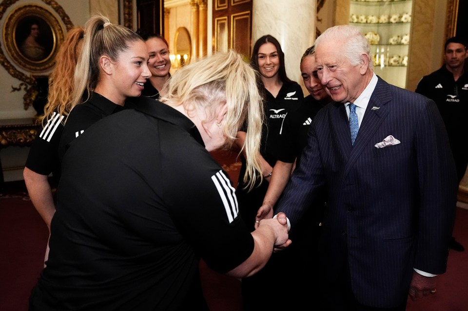 Charles seemed excited to meet the rugby team