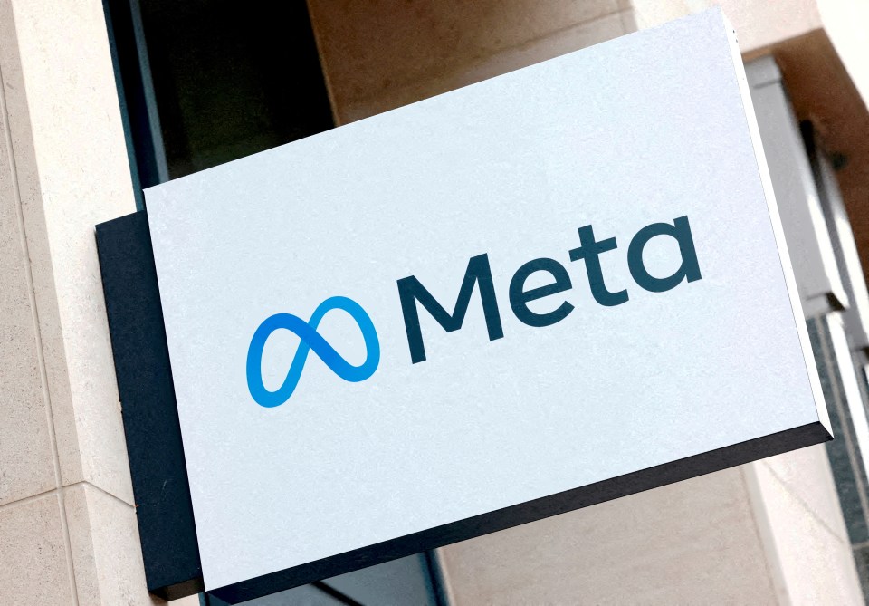 Meta logo on a building sign.