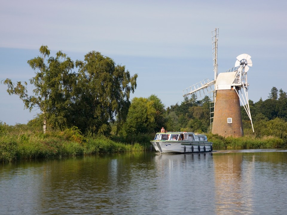 Six of us stayed on the Fair Statesman, a gleaming white motor cruiser rented from Norfolk Broads Direct