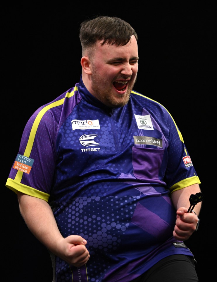 Littler wore the old version of his shirt at Ally Pally and throughout his Premier League run