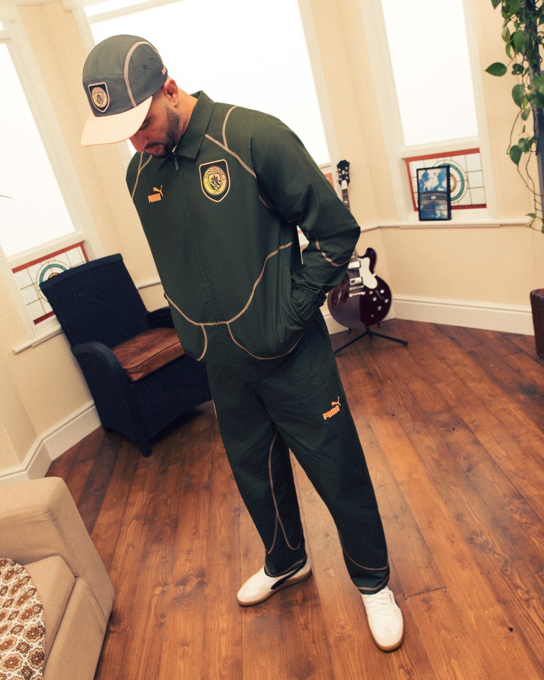 Kyle Walker donned a tracksuit designed by Noel Gallagher and Puma