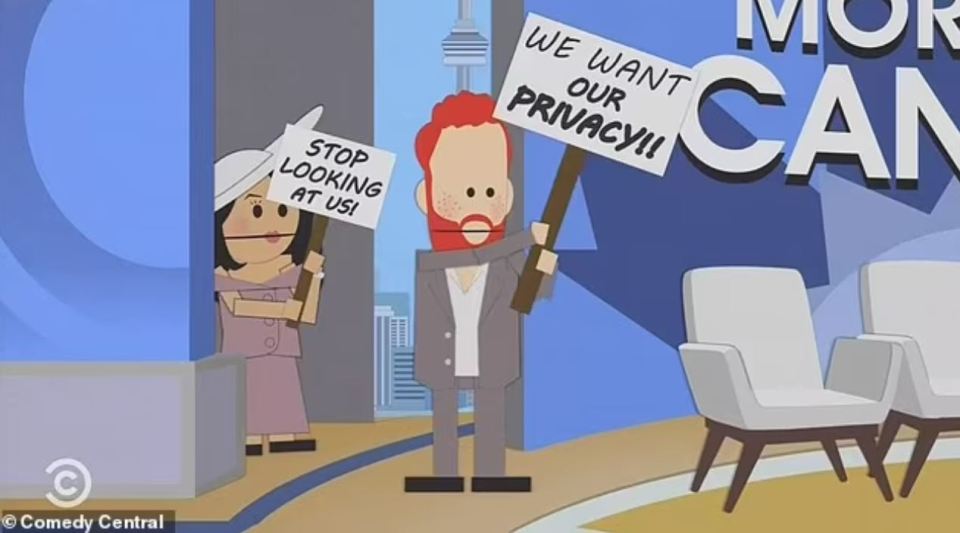 a man holding a sign that says we want our privacy