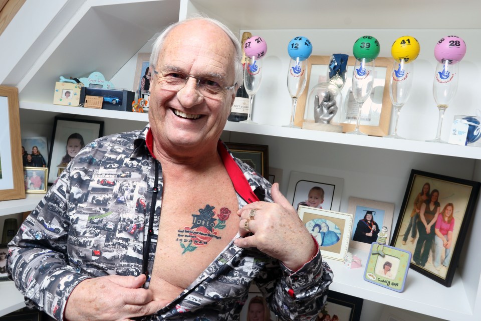 a man with a tattoo on his chest that says lotto on it