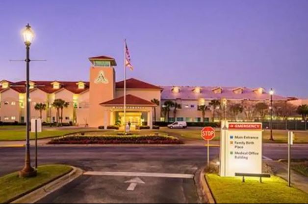 a large building with a stop sign in front of it .