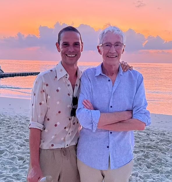 Paul O’Grady’s pictured with his husband Andre Portasio