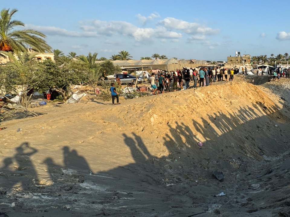 The site of a crater in the Al-Mawasi refugee camp