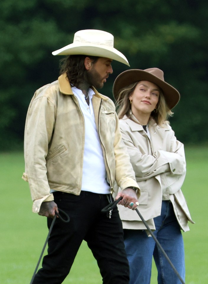 Pete Wicks and Jowita Przystal put on a cosy display as they headed out on a dog walk