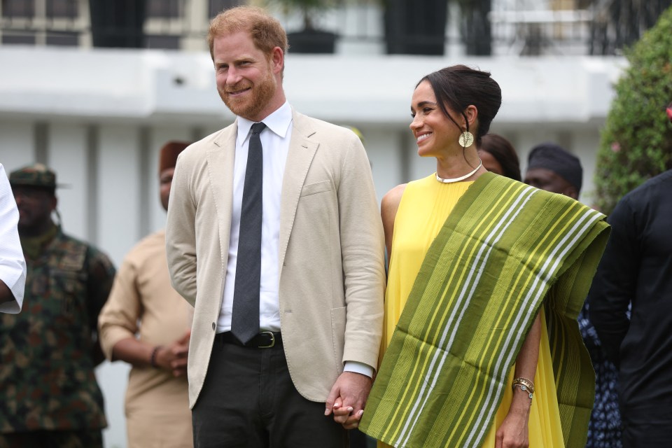 Harry and Meghan in Nigeria in May this year for a 'faux royal tour'