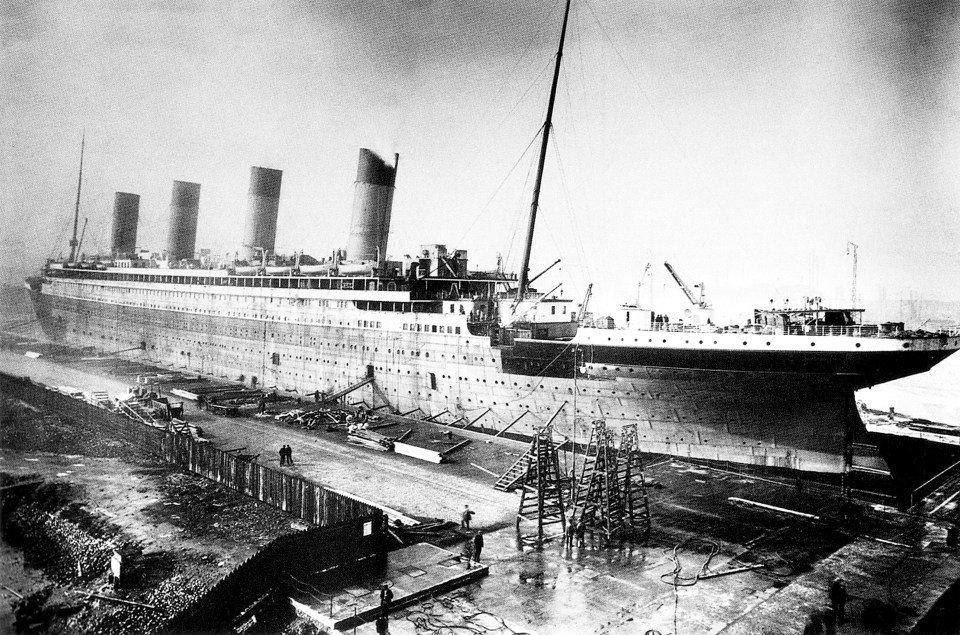 a black and white photo of a large ship called the titanic