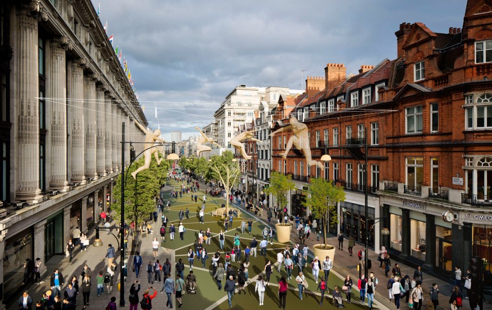 a large group of people are walking down a busy street in front of a store called oliver smith