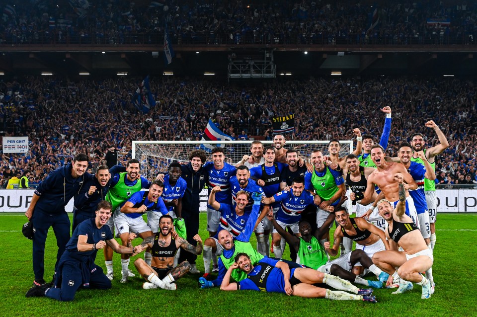 a group of soccer players posing for a photo with one wearing a shirt that says sport