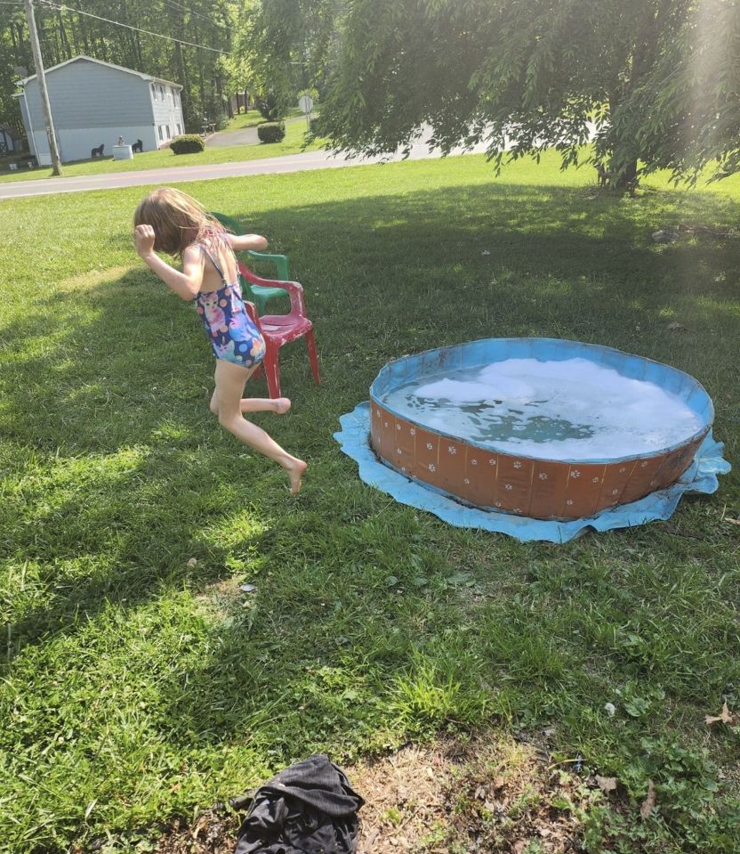 Ashtynn had been playing in the paddling pool when she slipped on the grass