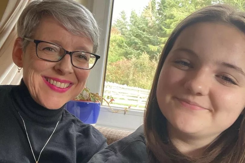 Sarah Anderson with her daughter Emily, who was left paralysed in hospital