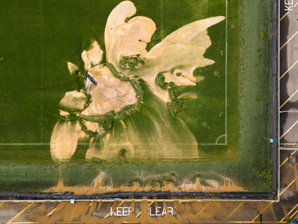 an aerial view of a soccer field with the words keep and lear written on the ground