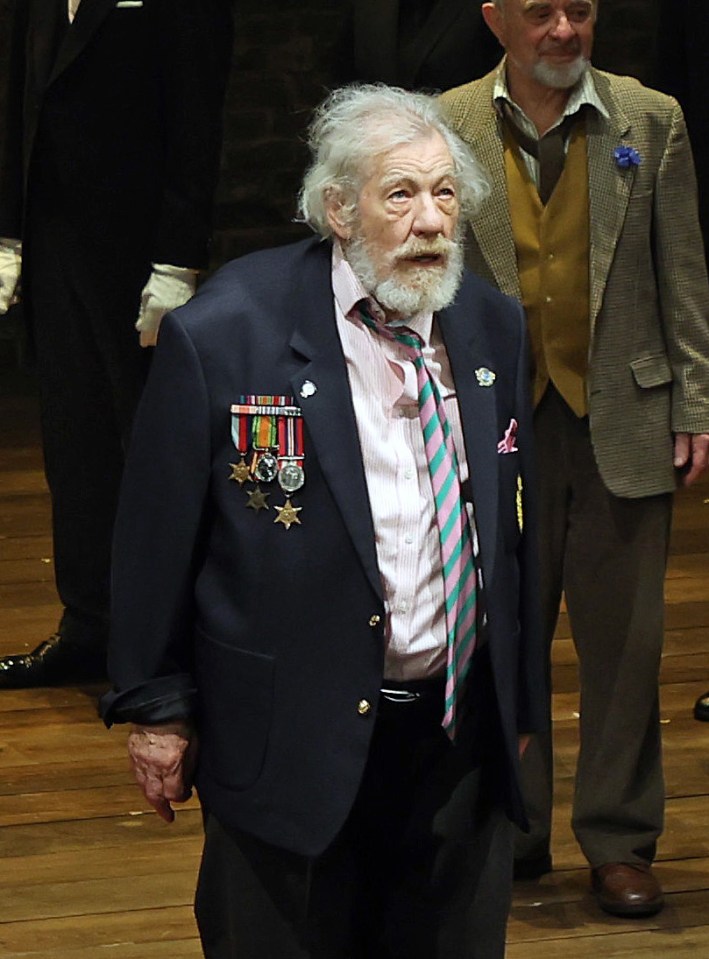 a man with a beard and medals on his jacket