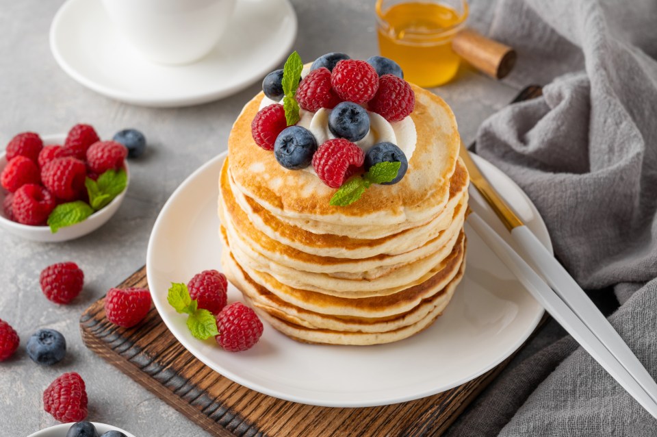 Serve cottage cheese pancakes warm with fresh fruit and honey