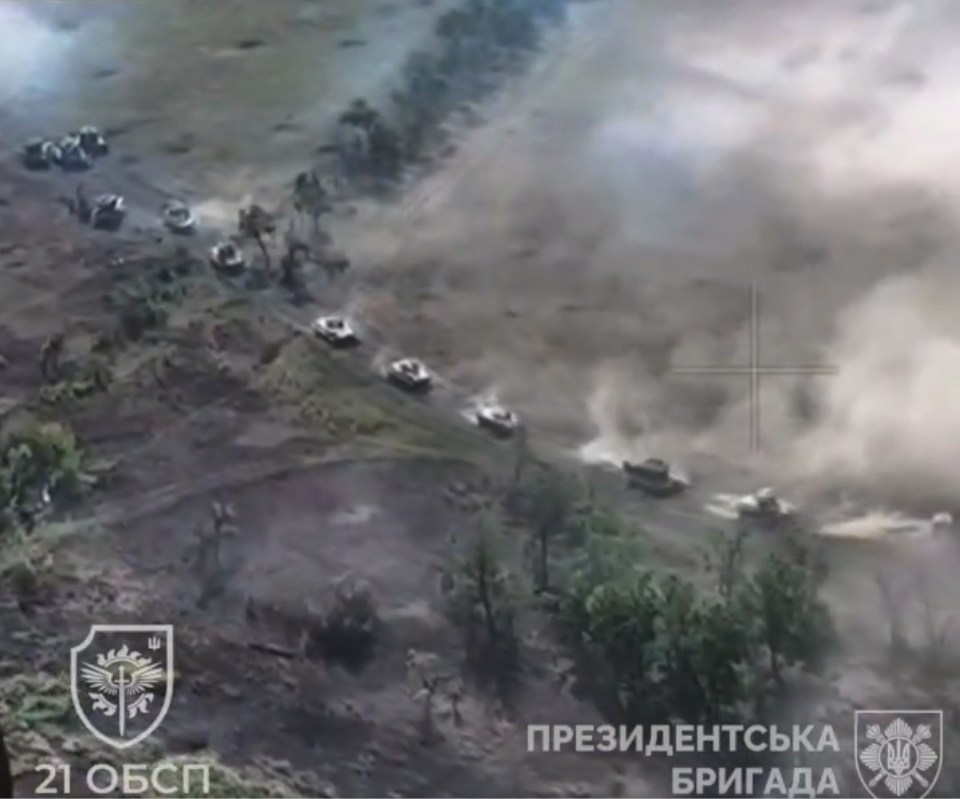 an aerial view of a field with a logo for the 21 obcp