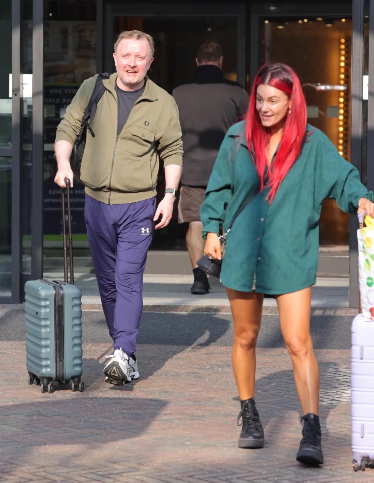 Chris McCausland and Dianne Buswell were all smiles as they headed off. Credit: ISO IMAGES LTD