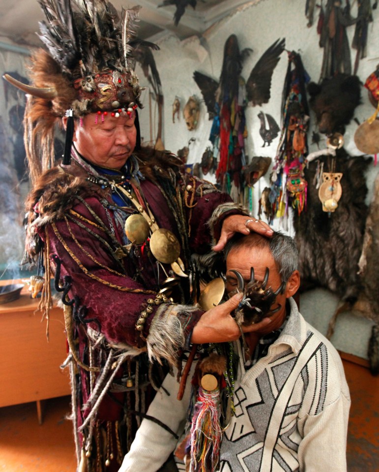 Kara-ool Dopchun-ool (L), supreme shaman who is known to have close ties with the Kremlin