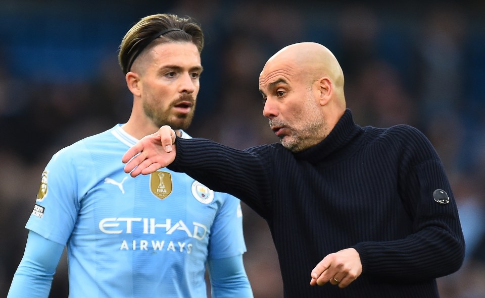 a man in an etihad airways jersey talks to another man