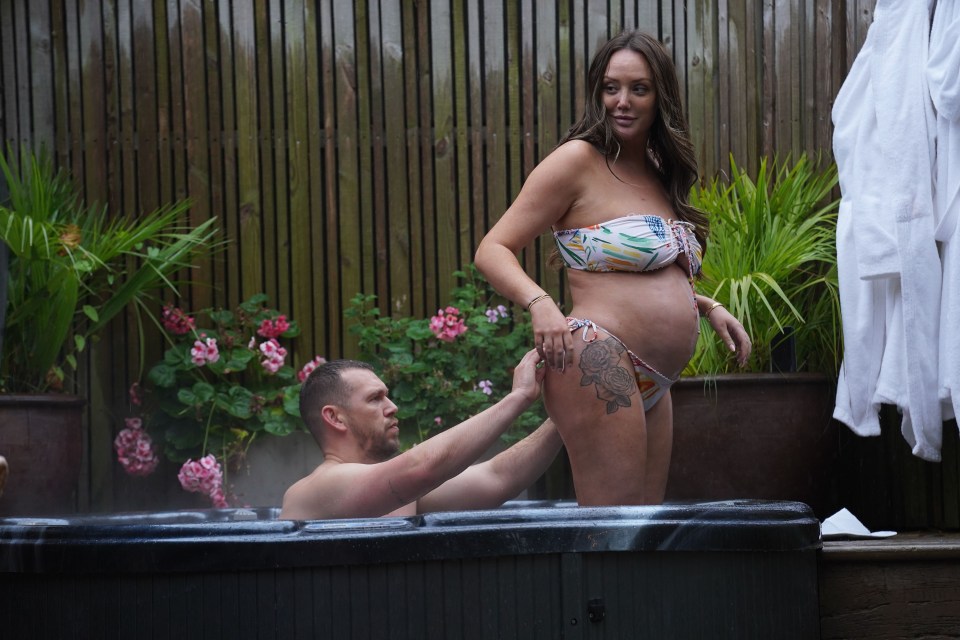 She avoided submerging into the hot tub as per pregnancy guidelines