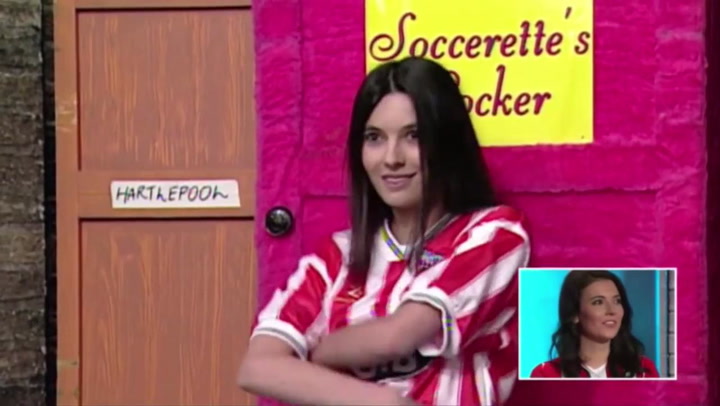 a woman in a red and white striped shirt stands in front of soccerette 's locker